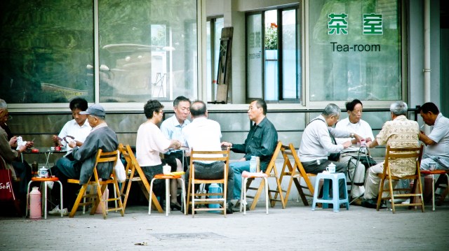 Playing cards in the park.
