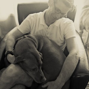 Thom enjoying some puppy love from our Izaak. I miss him so much!