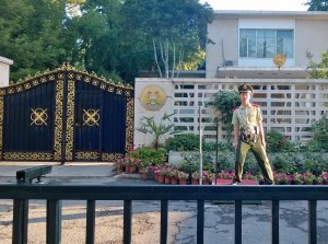 Guard at one of the Embassies coming to get me because I'm taking his picture!