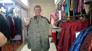 Thom checking out local shirts to get custom made at the AP market