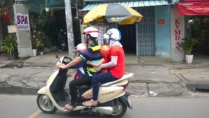 Vietnam's version of the mini van--scooter for 4!