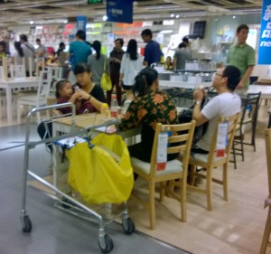 Family time--Enjoying picnic in dining room section at Ikea
