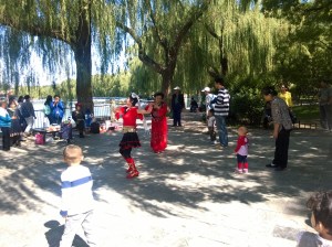 Ladies in Red dancing for the crowds in Beihai Park
