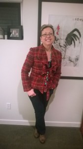 Plaid jacket accented with turquoise long silver necklace