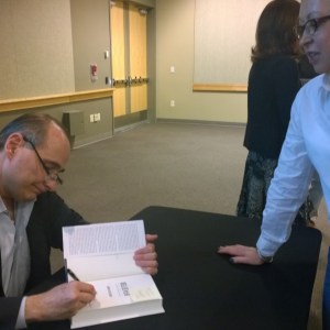 David Axelrod signing his book for me,  Very smart and funny guy.