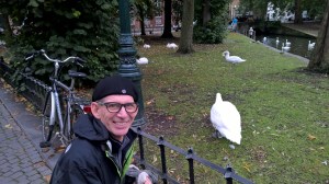 Thom talking to the swans that roam the canals