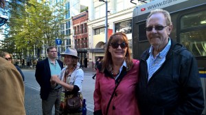 Patti and Larry enjoying Leni's stories on the walking tour of Gastown