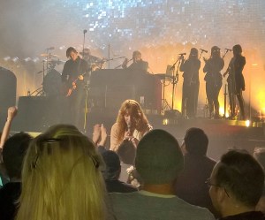Florence greeted the front row with flowers.